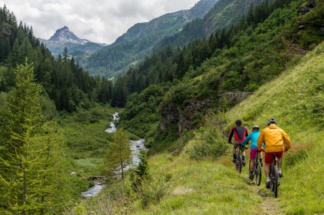 Grab an e-bike and follow your guide up mountain trails and awe-inspiring views